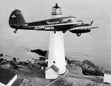Flying Santa over Boston Light in 1947